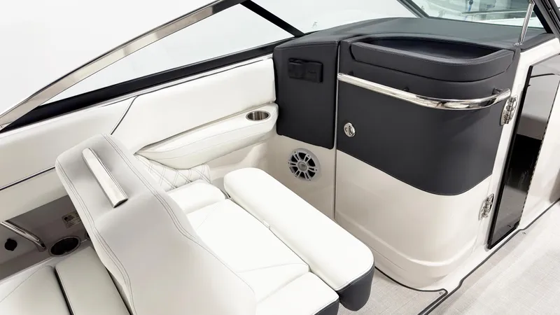 Slide: The Image of Luxurious interior of 2025 Regal LX4 boat with white seating and sleek design. - 8