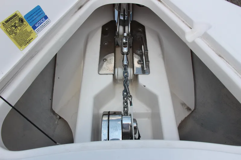 Slide: The Image of Anchor chain mechanism on a 2016 Pursuit S 280 Sport boat. - 16