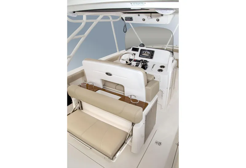 Slide: The Image of Manufacturer Provided Image: 2016 Pursuit S 280 Sport boat interior with helm and seating area. - 31