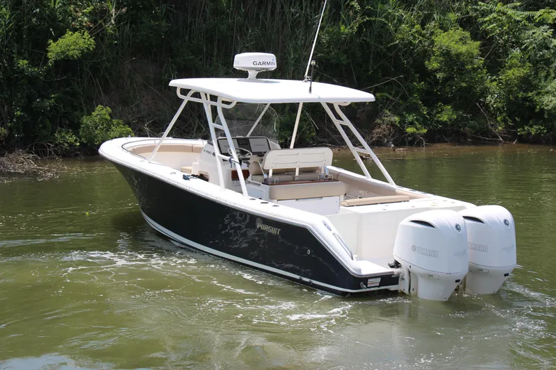 Slide: The Image of 2016 Pursuit S 280 Sport boat with dual engines on a calm river. - 6