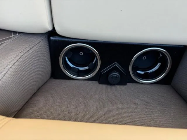 Slide: The Image of Cup holders in 2025 Harris Sunliner 230 boat interior. - 16