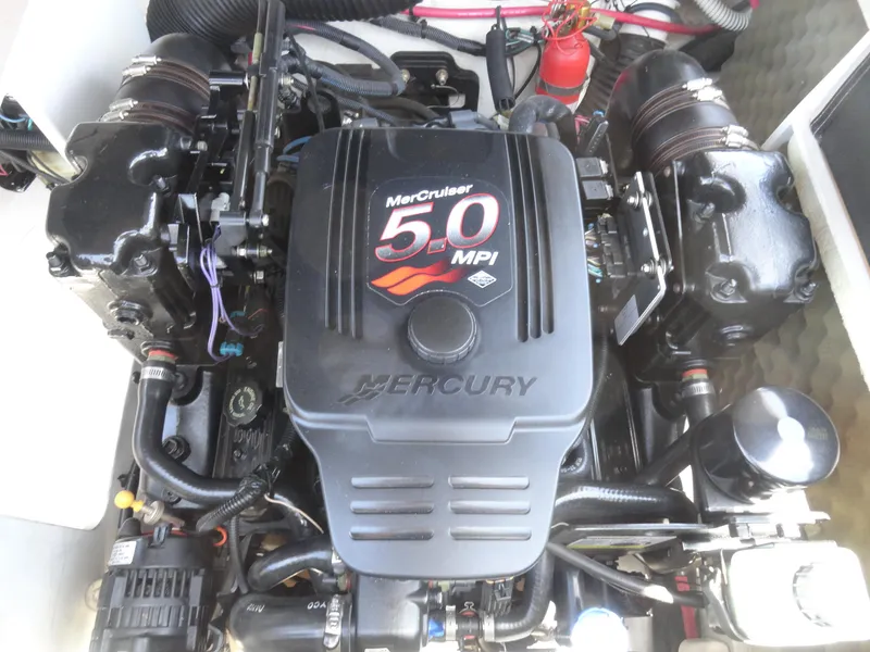 Slide: The Image of MerCruiser 5.0 MPI engine in 2002 Sea Ray 220 Bow Rider boat. - 18