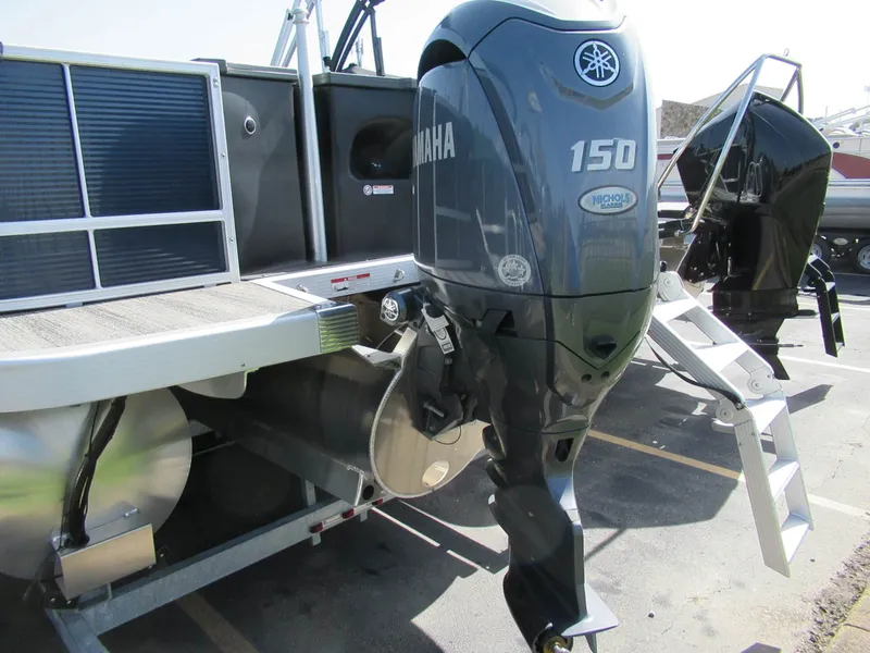 Slide: The Image of A 2025 Bennington 23 SF with a Yamaha 150 outboard motor. - 10