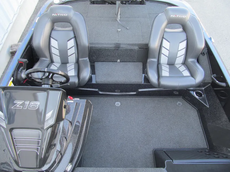 Slide: The Image of 2021 Nitro Z18 Pro boat interior with dual seats and steering console. - 12