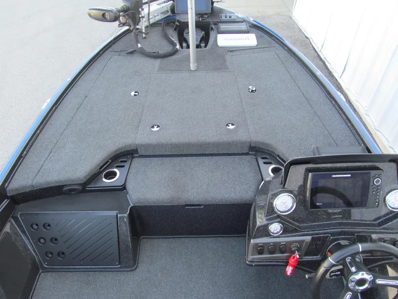 Slide: The Image of 2021 Nitro Z18 Pro boat interior with steering console and navigation equipment. - 8