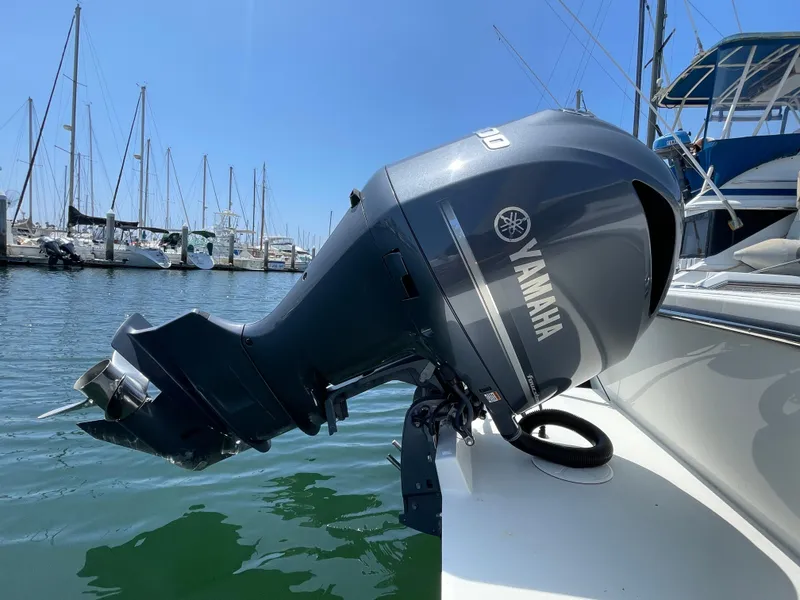 Slide: The Image of Yamaha outboard motor on 2016 Parker 2530 Extended Sport Cabin, docked at marina. - 10