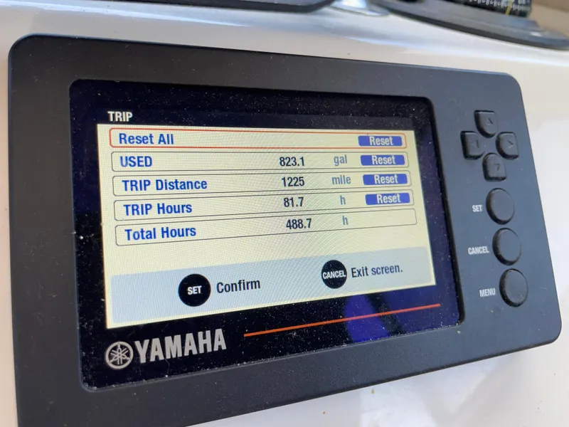 Slide: The Image of Yamaha display showing trip data: 823.1 gallons used, 1225 miles, 81.7 trip hours. - 30