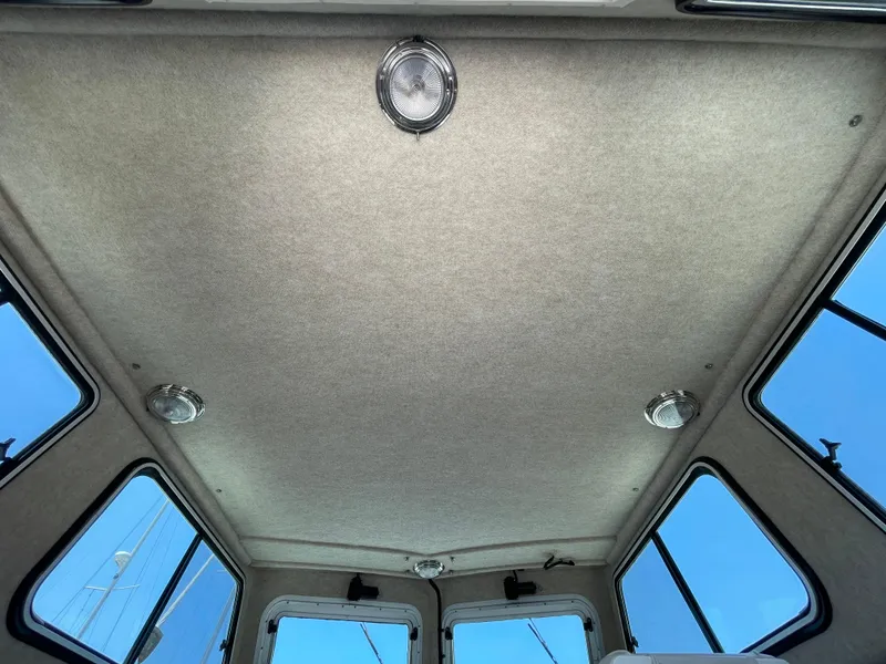Slide: The Image of Interior ceiling of 2016 Parker 2530 Extended Sport Cabin with lights and windows. - 40