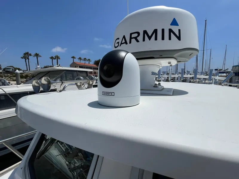 Slide: The Image of 2016 Parker 2530 Extended Sport Cabin with Garmin radar and Sionyx camera on roof. - 6