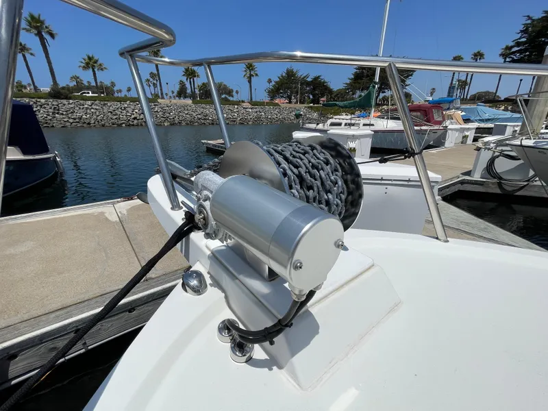 Slide: The Image of 2016 Parker 2530 Extended Sport Cabin boat anchor winch at marina dock. - 7