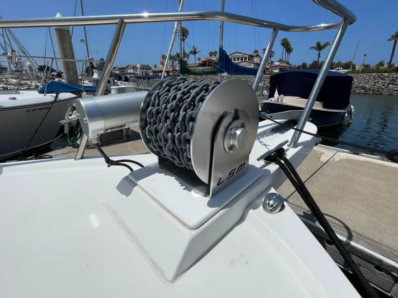 Slide: The Image of Anchor winch on 2016 Parker 2530 Extended Sport Cabin boat at marina. - 8