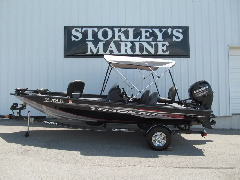 Slide: The Image of 2019 Tracker Pro Team 175 TXW boat at Stokley's Marine, featuring a Mercury engine. - 13