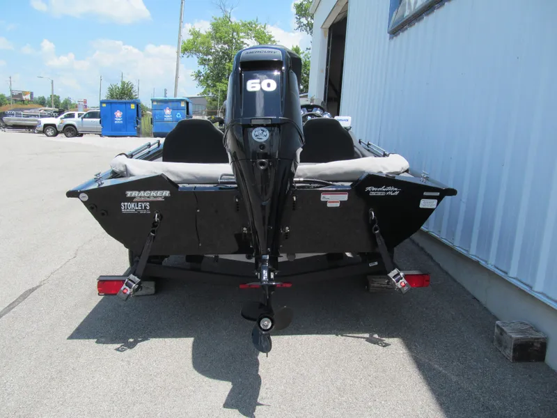 Slide: The Image of 2019 Tracker Pro Team 175 TXW boat with Mercury 60 engine, parked outdoors. - 4
