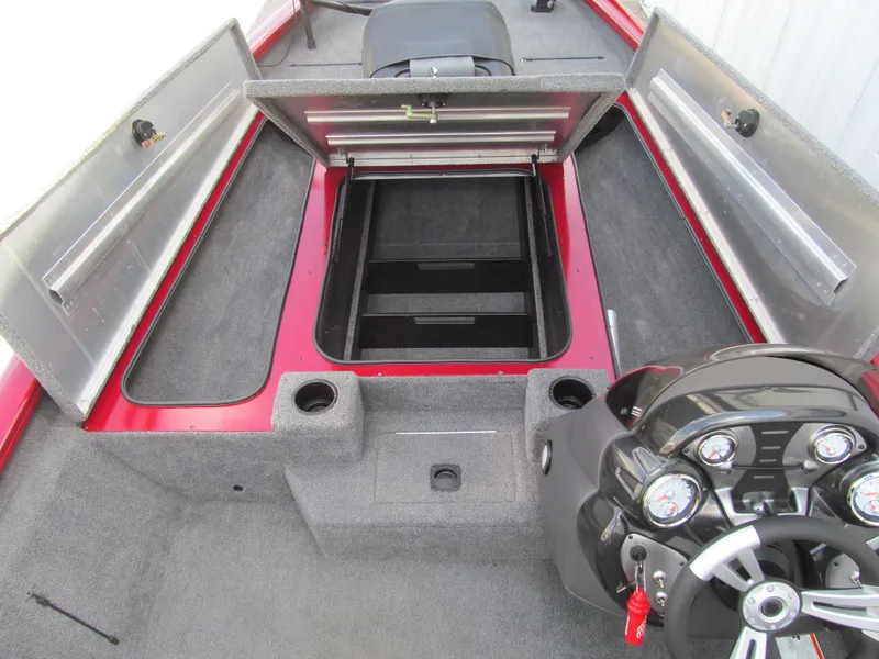 Slide: The Image of 2019 Tracker Pro Team 190 TX Tournament Edition boat interior with open storage compartments. - 7
