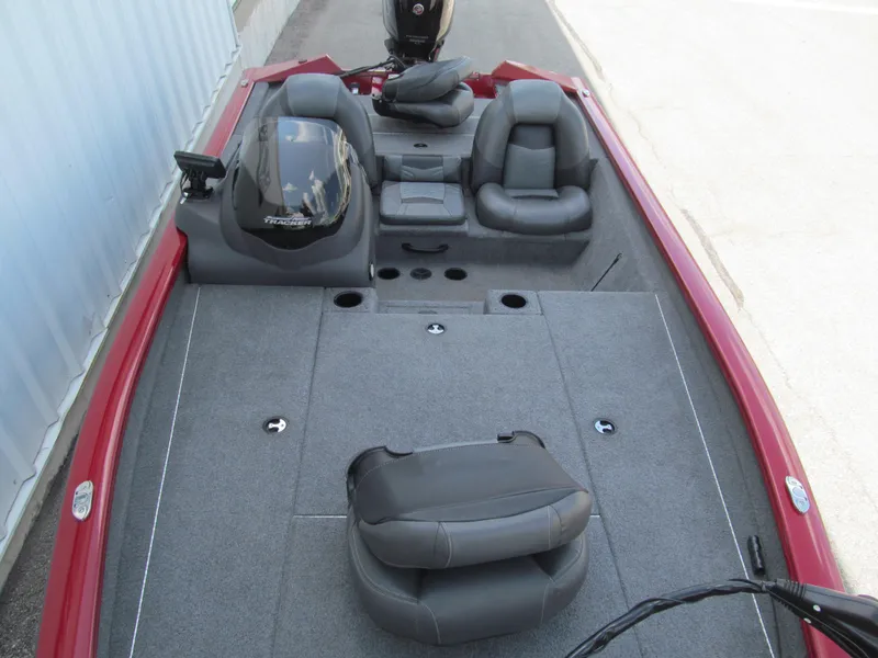 Slide: The Image of 2019 Tracker Pro Team 190 TX Tournament Edition boat interior with seating and control panel. - 9