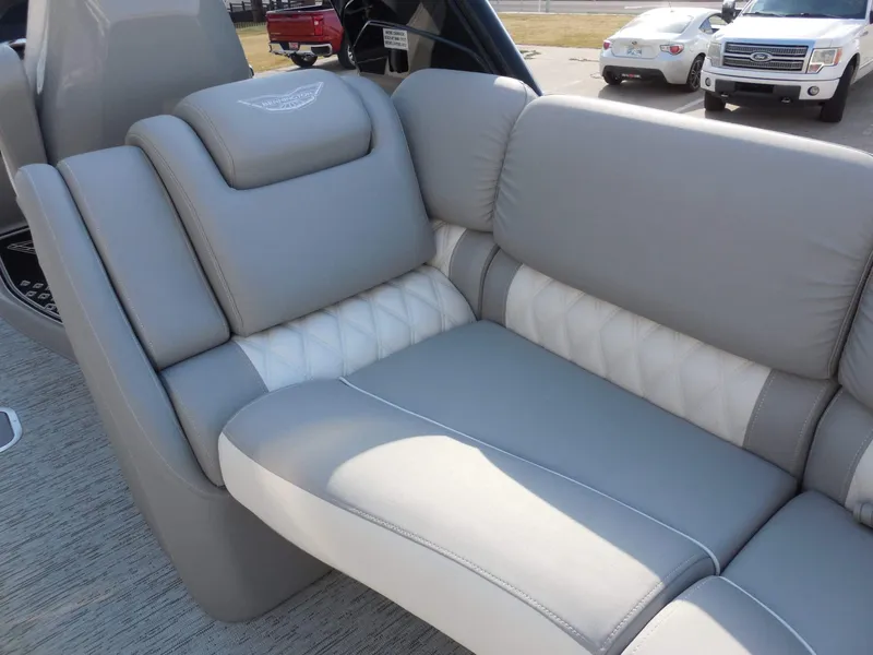 Slide: The Image of Luxurious gray and white upholstery on a boat seat, featuring quilted details. - 25