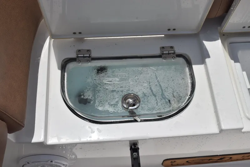 Slide: The Image of Livewell compartment on 2021 Sea Hunt Ultra 255 SE boat. - 24
