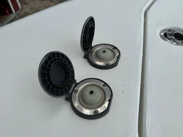 Slide: The Image of 2016 Sea Hunt Gamefish 27 boat deck with open fuel caps. - 18