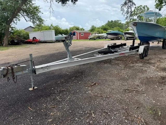 Slide: The Image of 2016 Sea Hunt Gamefish 27 boat on trailer in outdoor storage area. - 8