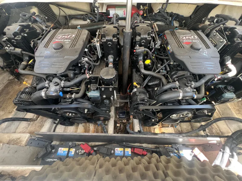 Slide: The Image of Twin MerCruiser engines in a 2007 Sea Ray 290 SLX boat engine compartment. - 24
