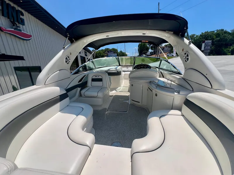 Slide: The Image of 2007 Sea Ray 290 SLX boat interior with spacious seating and modern design. - 5