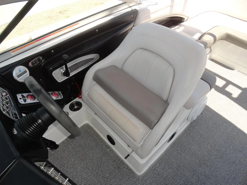 Slide: The Image of 2006 MasterCraft X-45 boat interior with captain's seat and control panel. - 13