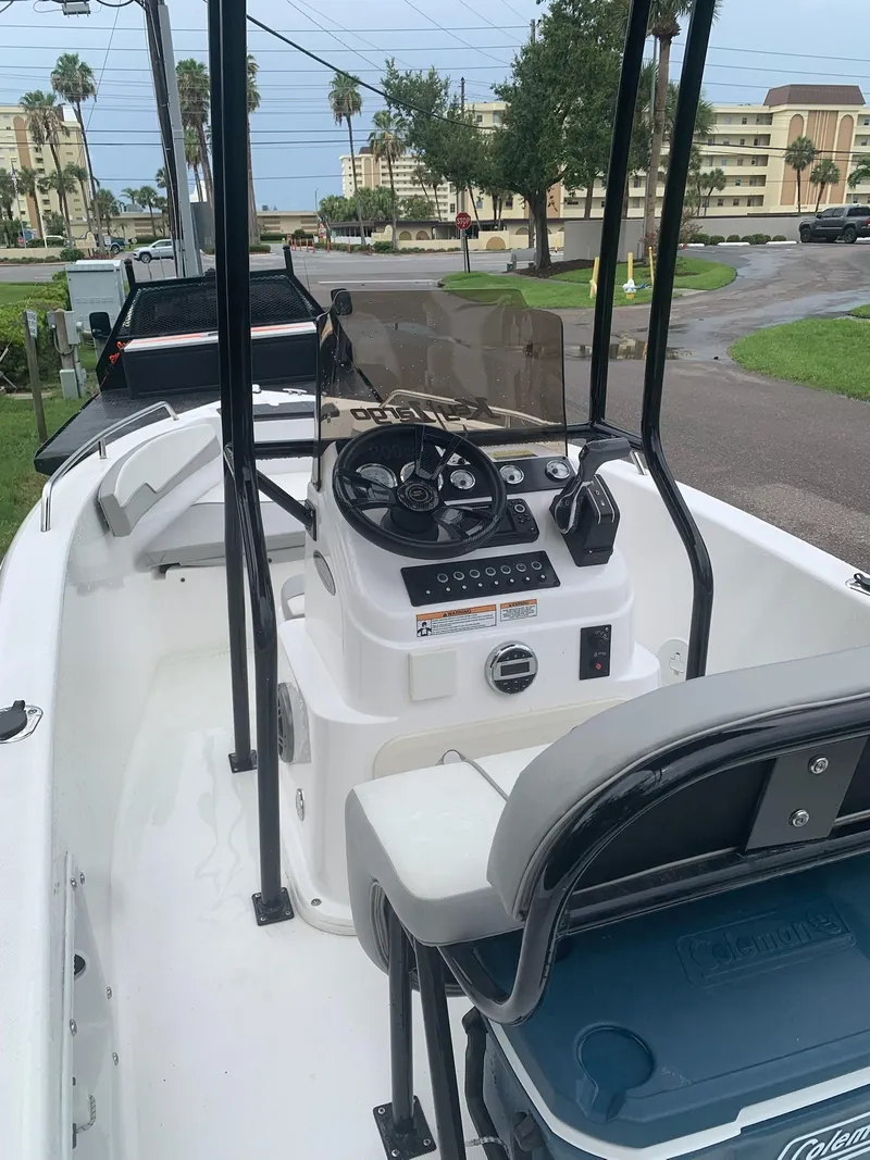 Slide: The Image of 2015 Key Largo 180 Center Console boat interior with steering wheel and controls. - 3