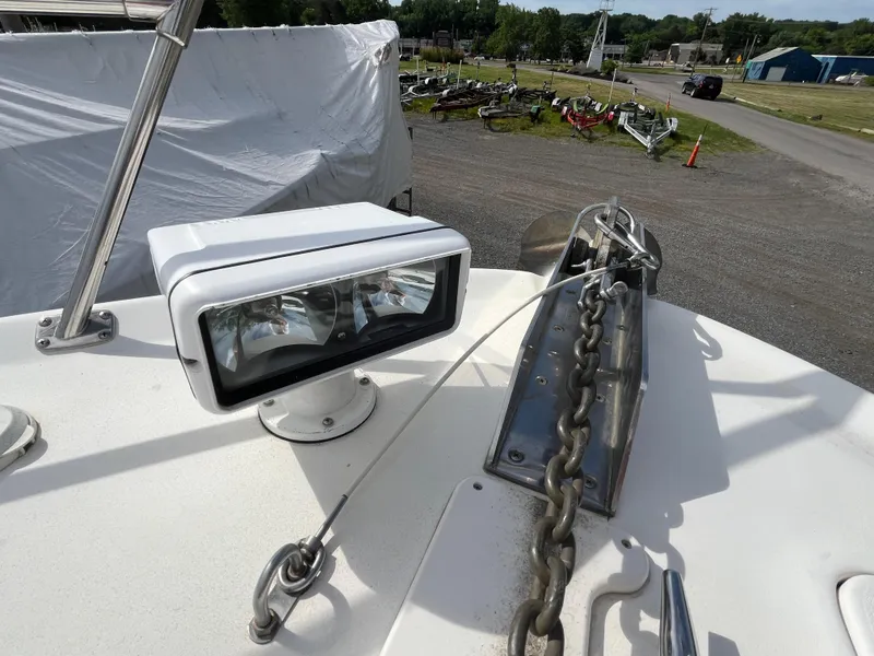 Slide: The Image of 1999 Sea Ray 400 Sundancer bow with anchor chain and spotlight. - 32