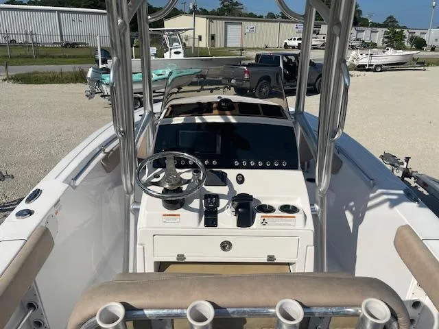 Slide: The Image of 2020 Sportsman 221 Heritage boat dashboard with steering wheel and controls. - 7