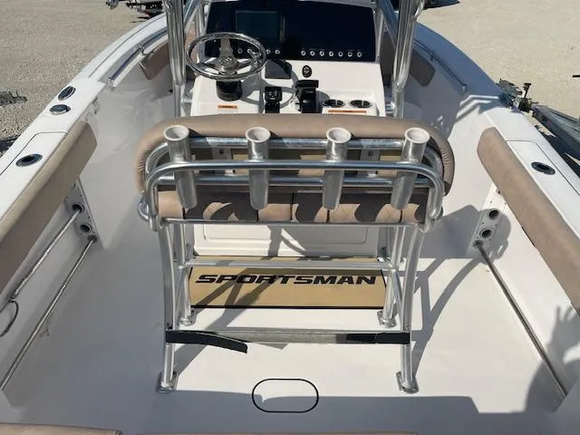 Slide: The Image of 2020 Sportsman 221 Heritage boat interior with steering console and rod holders. - 8