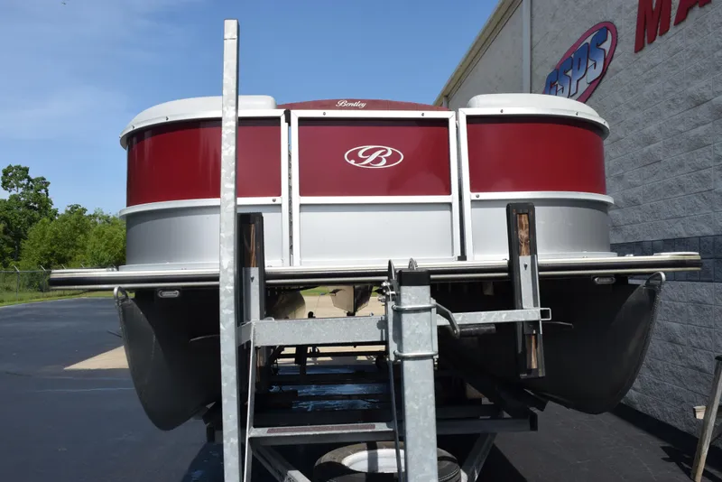 Slide: The Image of 2022 Bentley Pontoons 220 Fish N Cruise on trailer, red and silver design. - 3