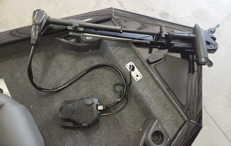 Slide: The Image of 2026 Tracker Pro Team™ 175 boat with trolling motor and foot pedal on deck. - 4