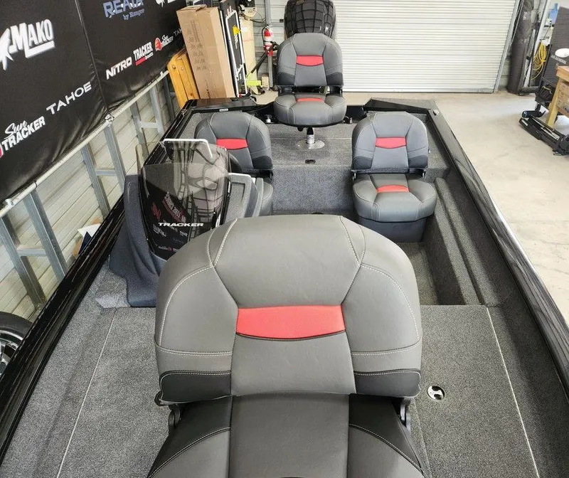 Slide: The Image of 2026 Tracker Pro Team™ 175 boat interior with gray and red seating. - 8