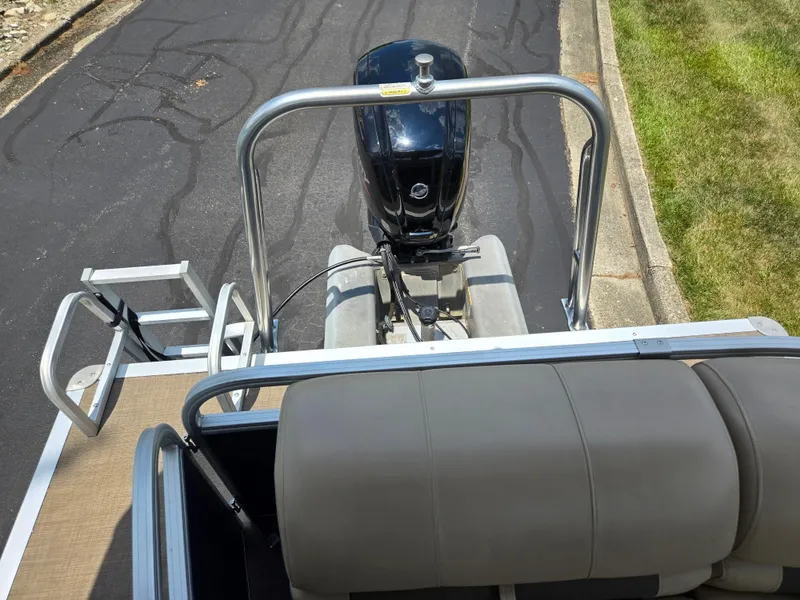 Slide: The Image of 2022 Sun Tracker Party Barge 20 DLX pontoon boat with motor and seating area. - 18