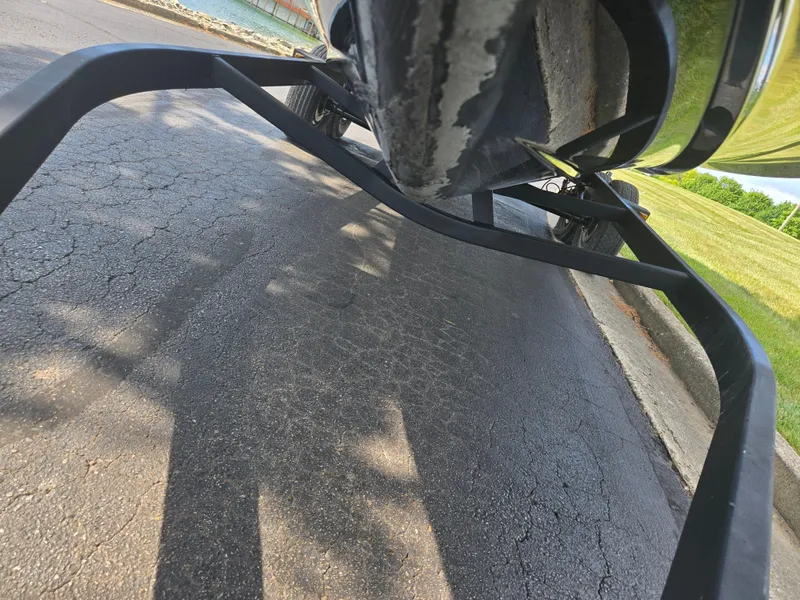 Slide: The Image of Underneath view of a 2021 Scarab 285 ID boat on a trailer. - 7