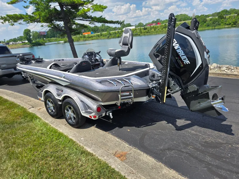 Slide: The Image of 2018 Ranger Z520 Comanche Ranger Cup boat by a lakeside on a trailer. - 1