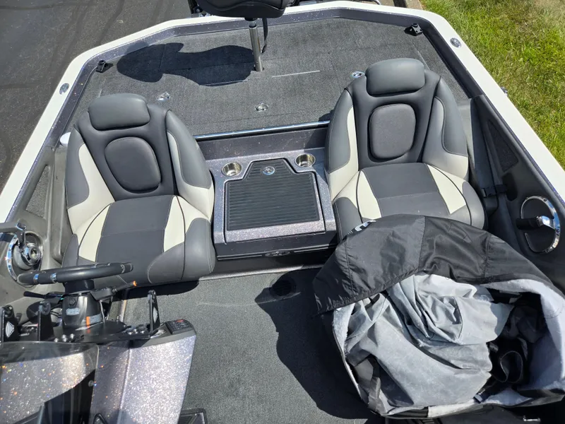 Slide: The Image of 2018 Ranger Z520 Comanche Ranger Cup boat interior with dual seats and steering console. - 18