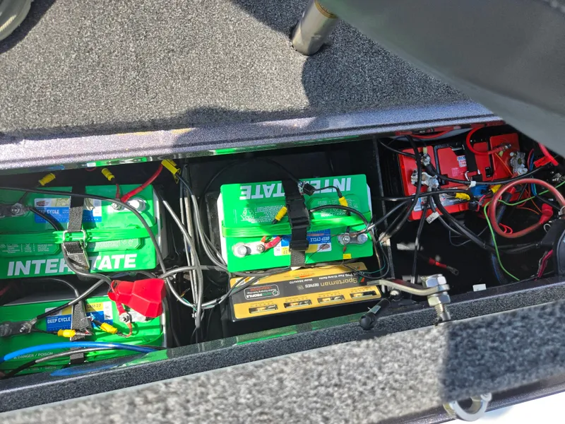 Slide: The Image of 2018 Ranger Z520 Comanche Ranger Cup boat battery compartment with Interstate batteries and wiring. - 21
