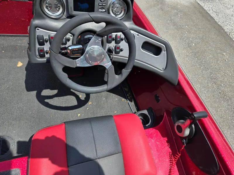 Slide: The Image of 2017 Skeeter TZX 190 boat cockpit with steering wheel and control panel. - 11