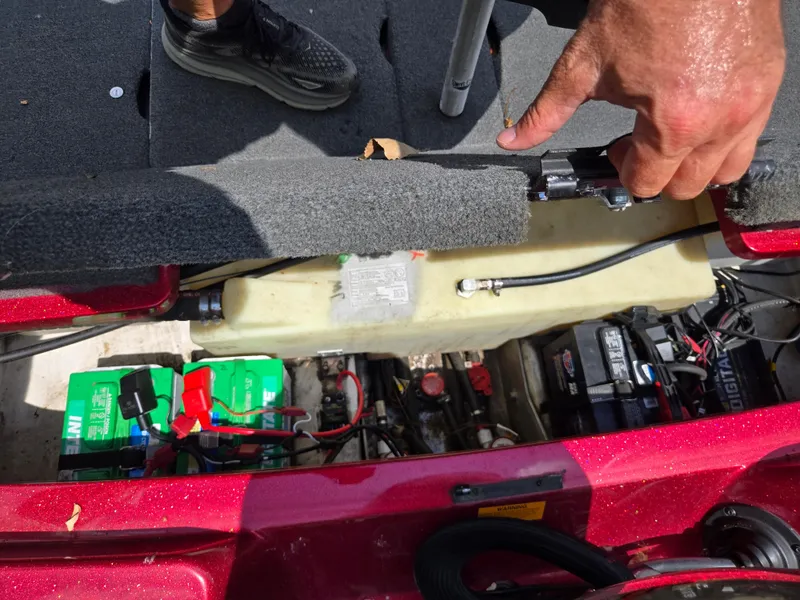 Slide: The Image of 2017 Skeeter TZX 190 boat interior showing battery compartment and wiring. - 21