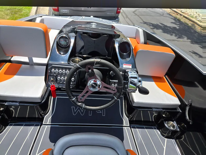 Slide: The Image of 2016 Heyday WT-1 boat interior with steering wheel and modern dashboard design. - 11
