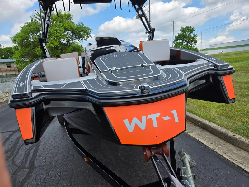 Slide: The Image of 2016 Heyday WT-1 boat on trailer, featuring sleek design and vibrant orange accents. - 6