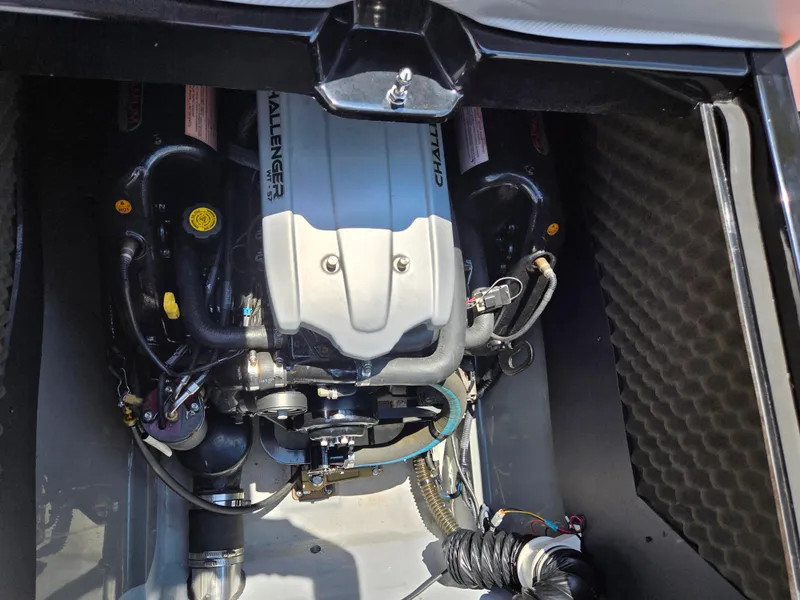 Slide: The Image of Engine compartment of a 2016 Heyday WT-1 boat, featuring a Challenger WT 157 engine. - 18