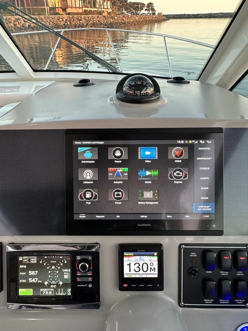 Slide: The Image of Dashboard of a 2014 Boston Whaler 315 Conquest with Garmin navigation system. - 29