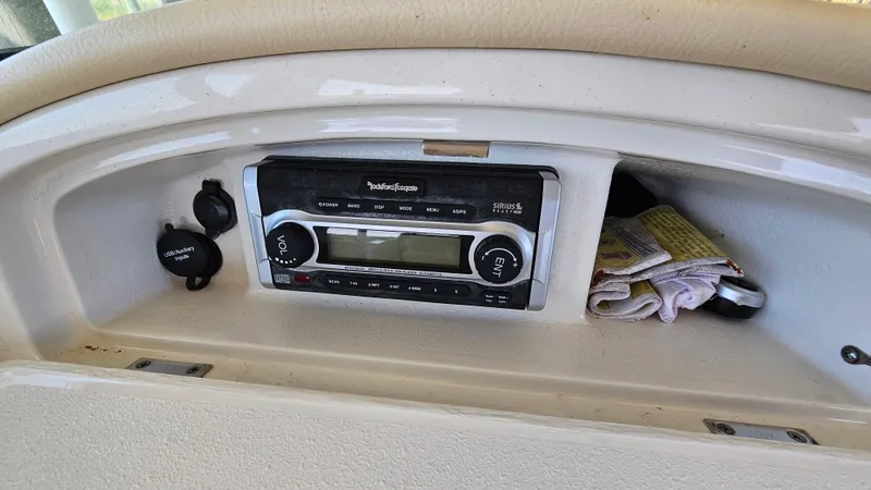 Slide: The Image of 2013 Chris-Craft Launch 22 dashboard with Rockford Fosgate stereo system. - 10