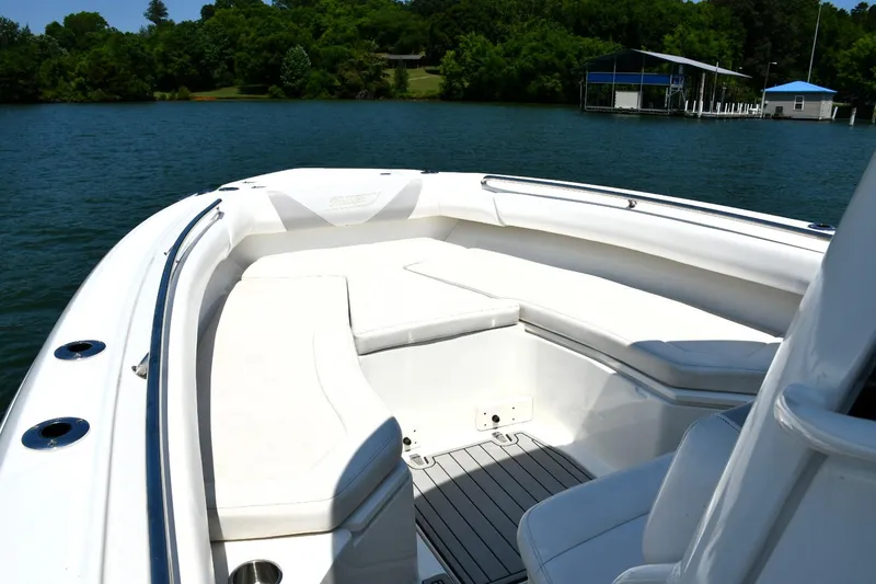 Slide: The Image of 2016 Boston Whaler 280 Outrage boat with twin engines on a lake. - 23
