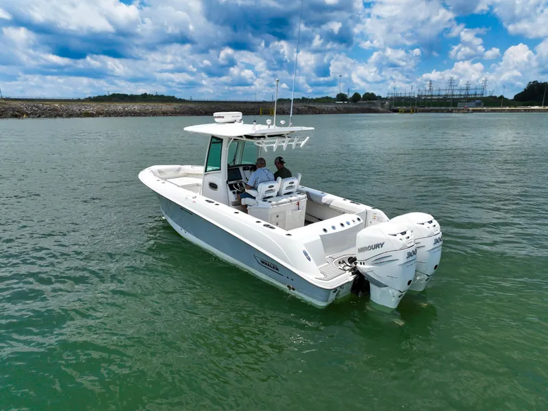 Slide: The Image of 2016 Boston Whaler 280 Outrage cruising on a lake under a cloudy sky. - 3