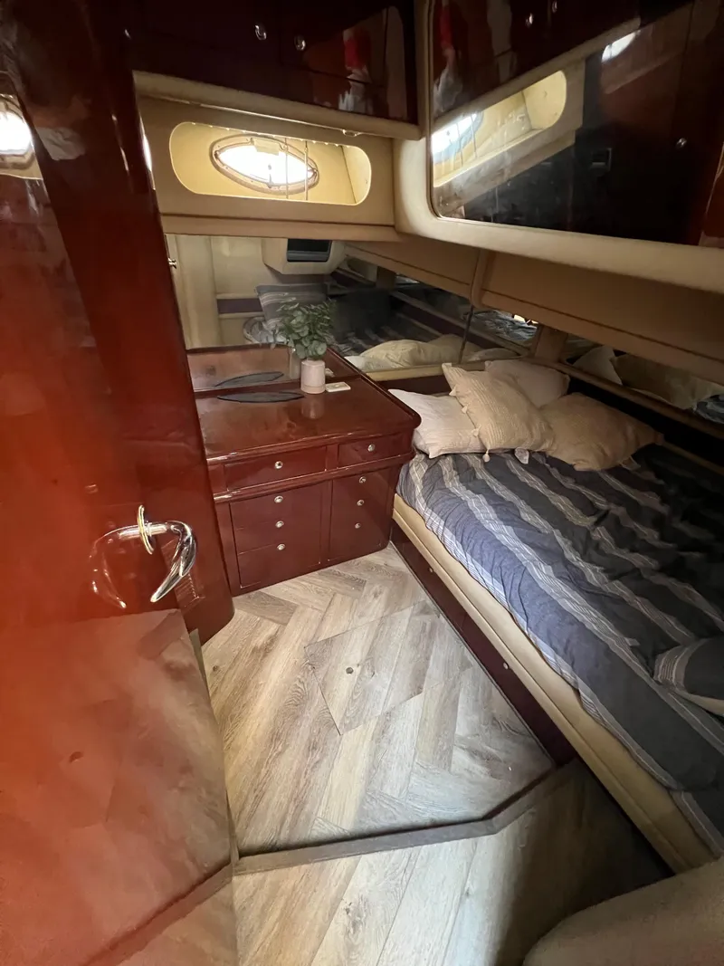 Slide: The Image of Luxurious cabin interior of a 2002 Sea Ray 560 Sedan Bridge yacht. - 47