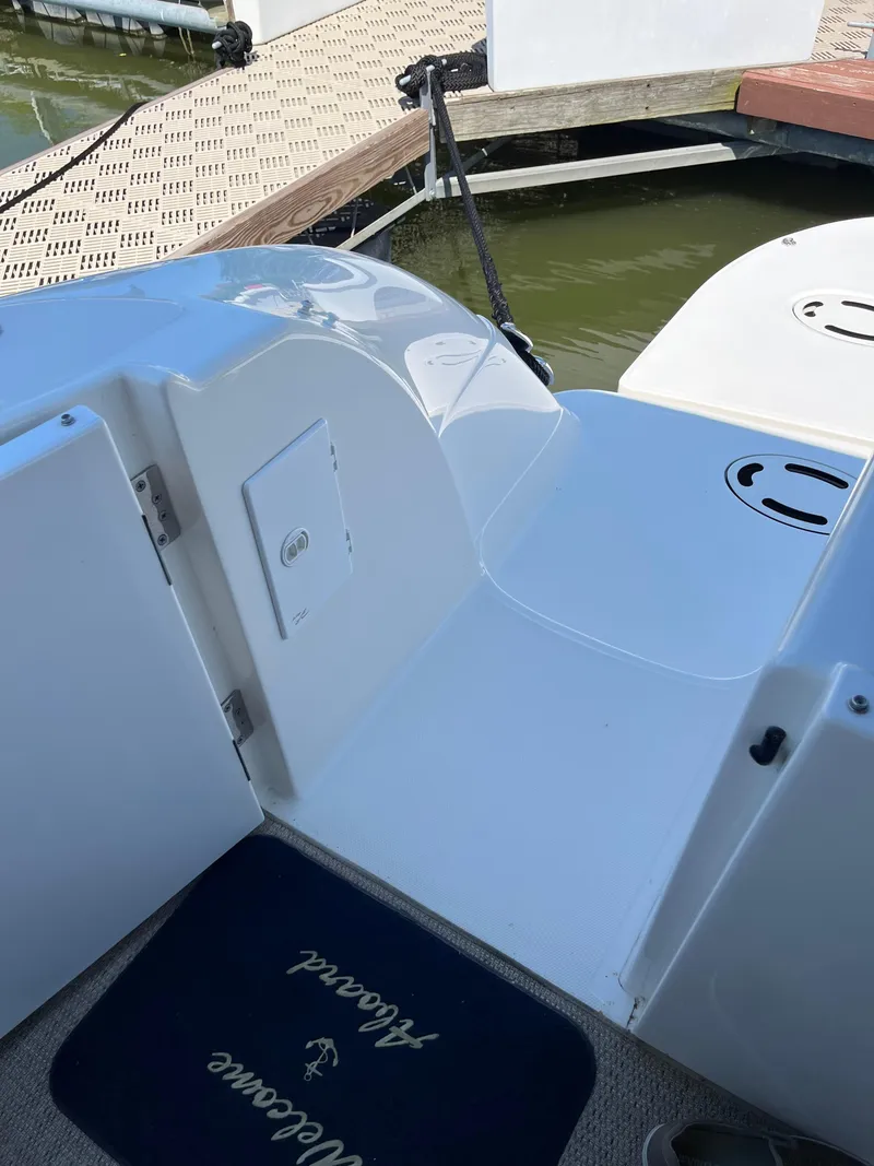 Slide: The Image of 2008 Sea Ray 58 Sedan yacht deck with welcome mat and dock view. - 10