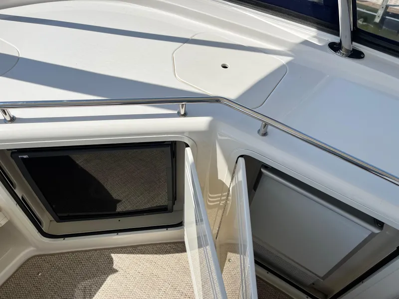 Slide: The Image of 2008 Sea Ray 58 Sedan yacht interior with open hatch and railing. - 18